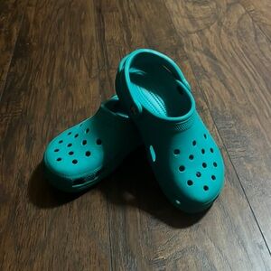 Teal crocs